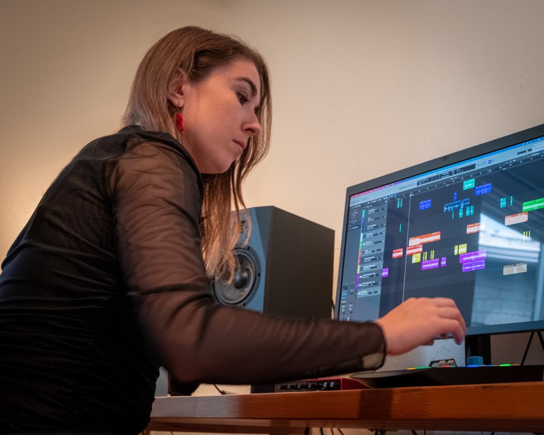 Julia composing on her computer.